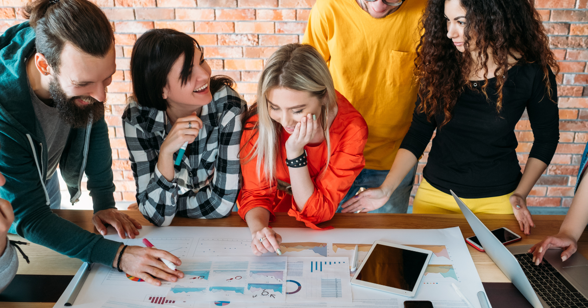 six people working in a creative and positive workplace