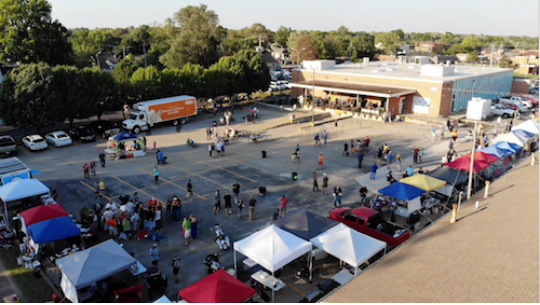 Bridge Space parking lot with people standing