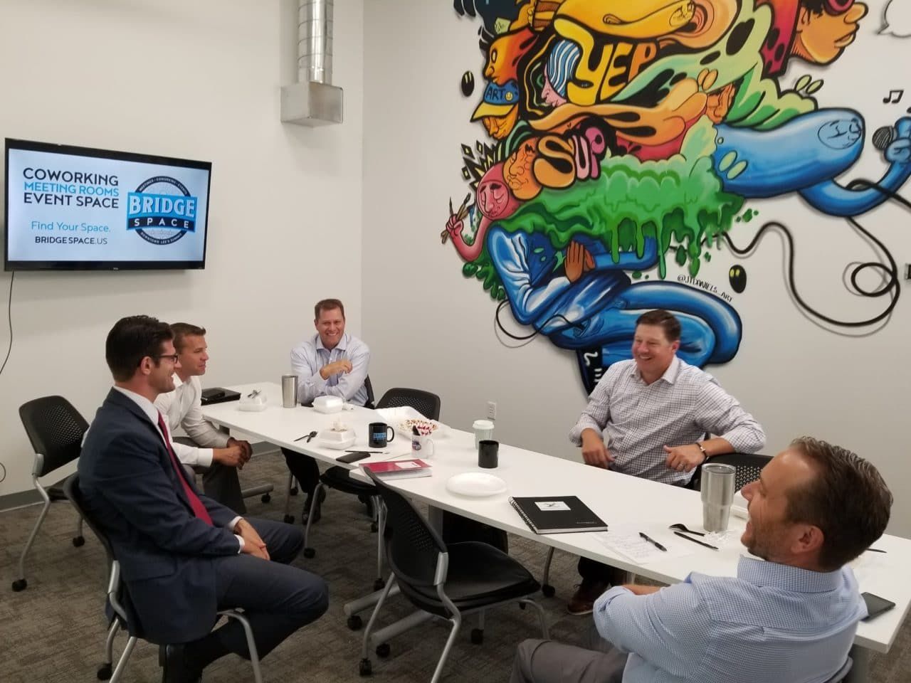 a business team enjoying time offsite for their meeting