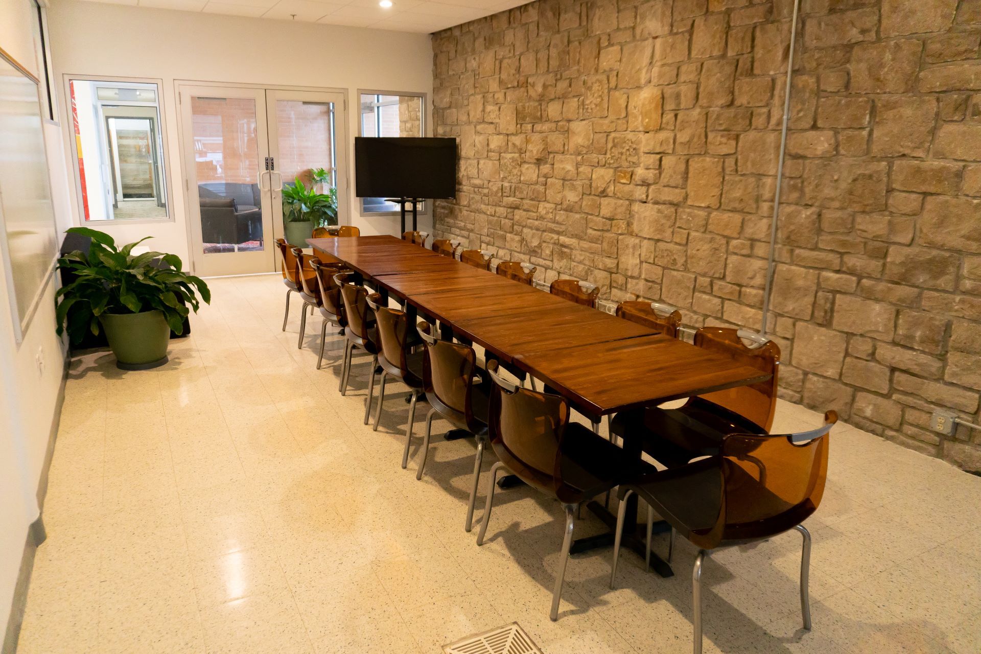large size conference room with brick walls