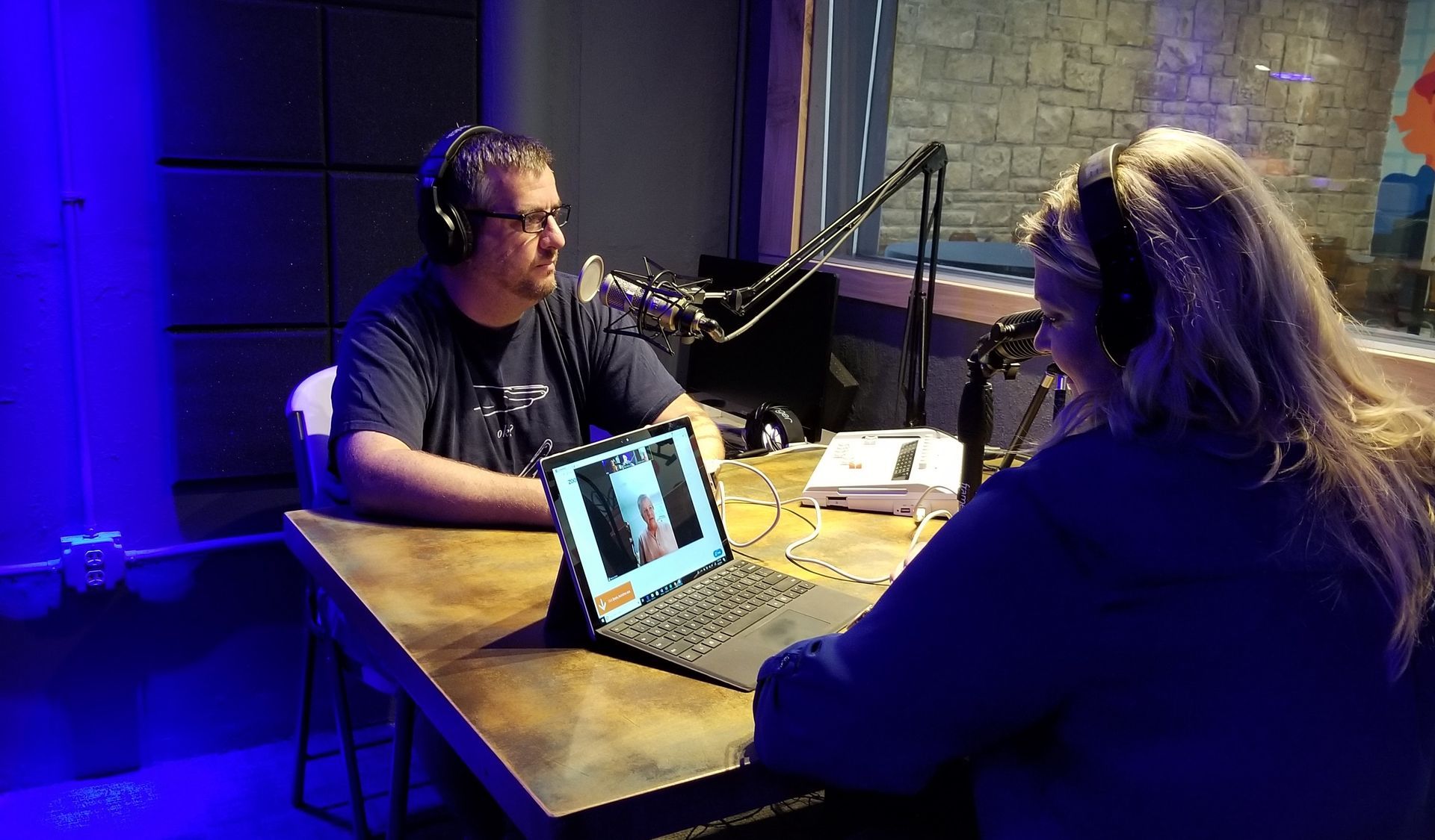 people sitting down recording a podcast in lees summit