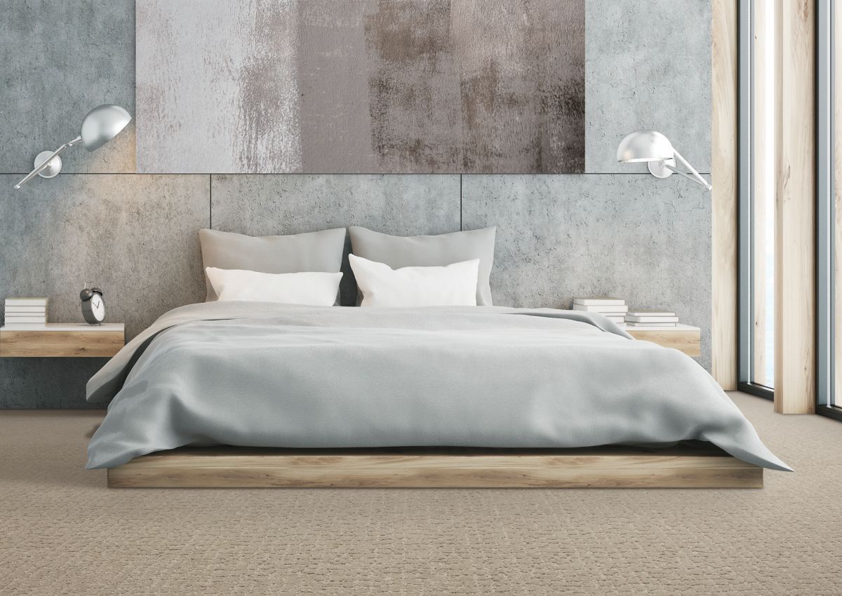a bedroom with a large painting on the wall above the bed