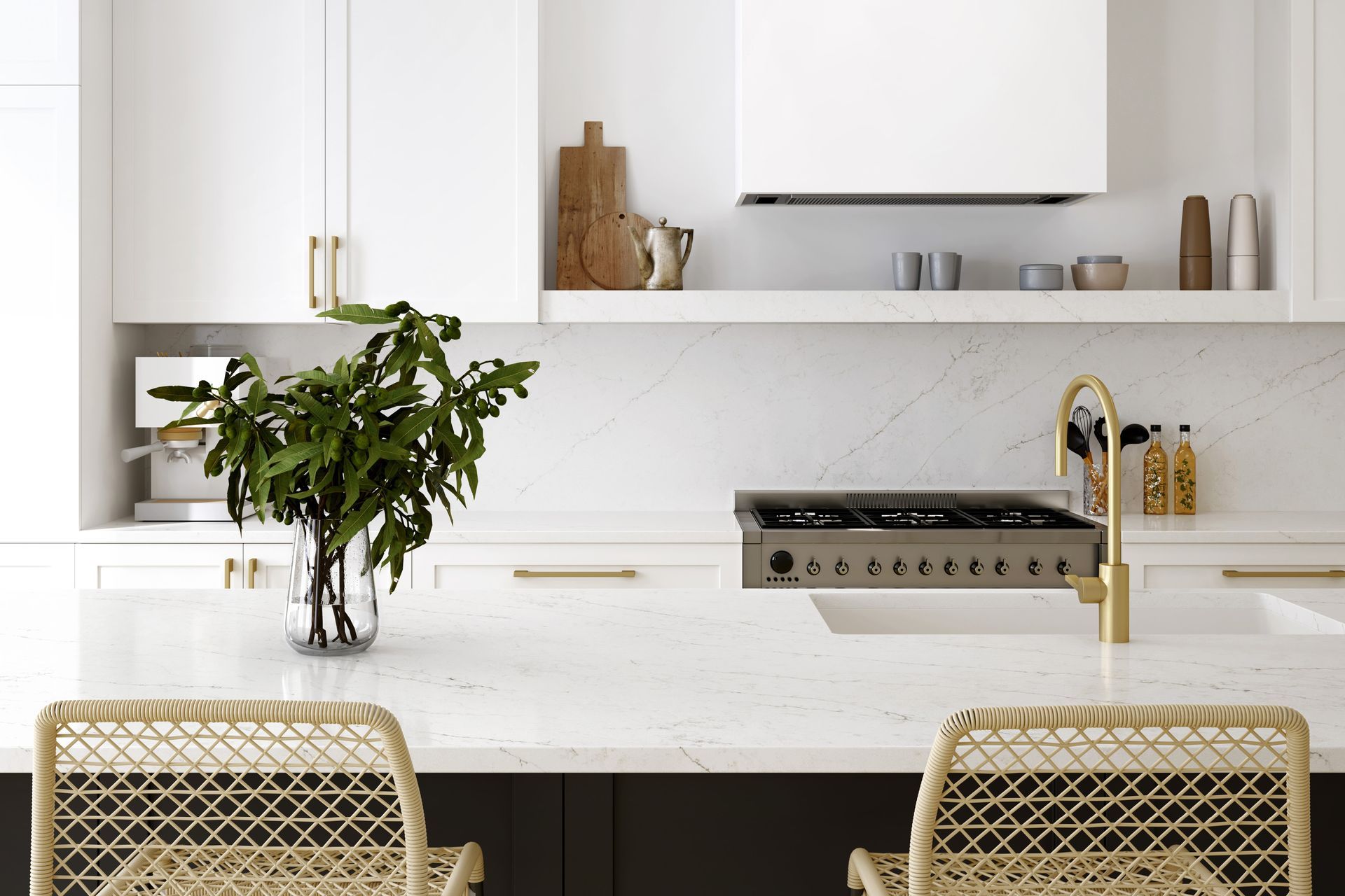 a kitchen with white cabinets and a stainless steel stove