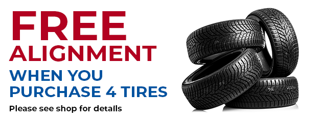 Offer: free alignment with purchase of 4 tires. Stacked tires.