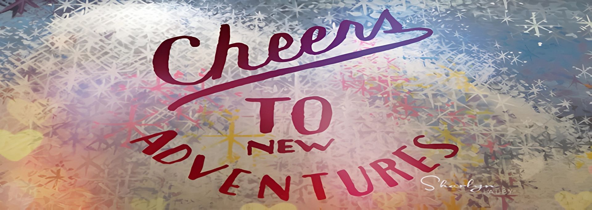 A sign that says cheers to new adventures on it