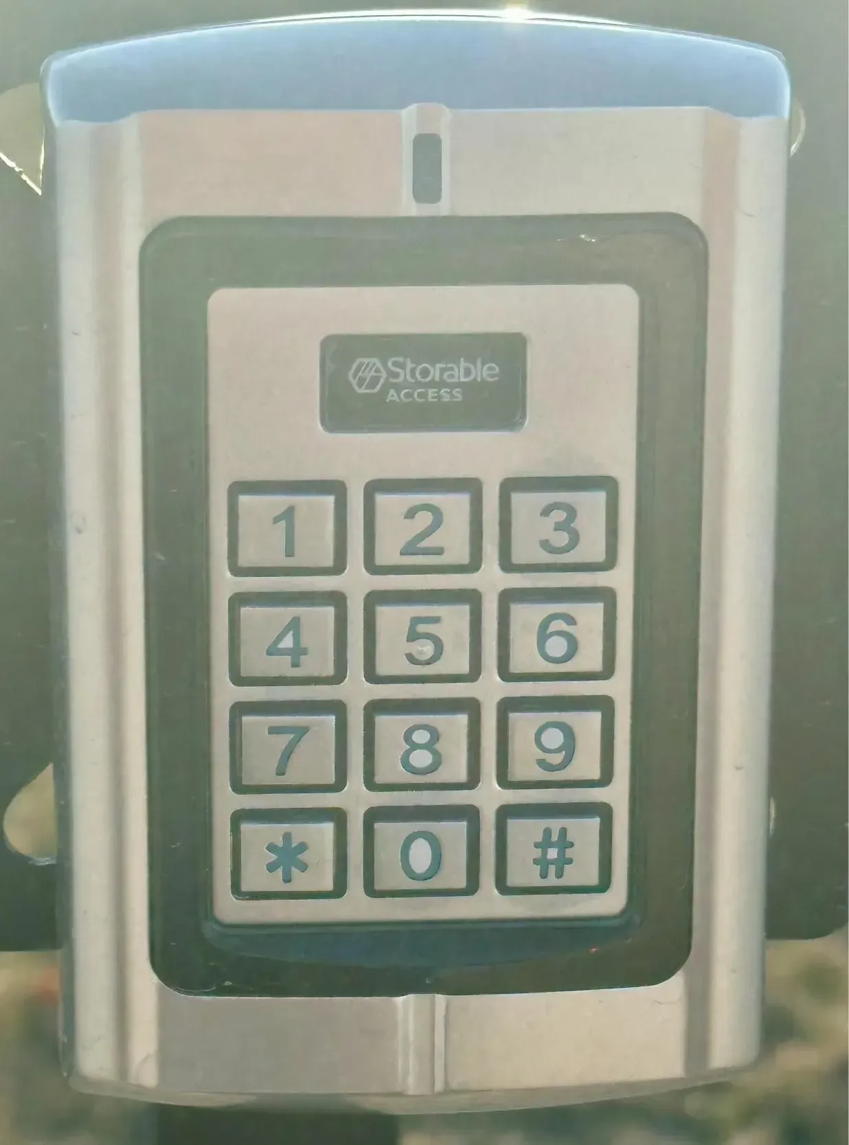 Close-up of a Storable Access digital keypad for secure self-storage entry.