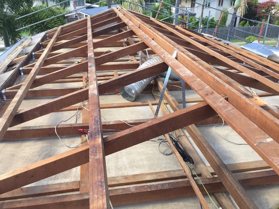 Wooden Roof Frame Under Construction, With Exposed Beams and Rafters — MJD Roofing Sunshine Coast in Cooroy, QLD