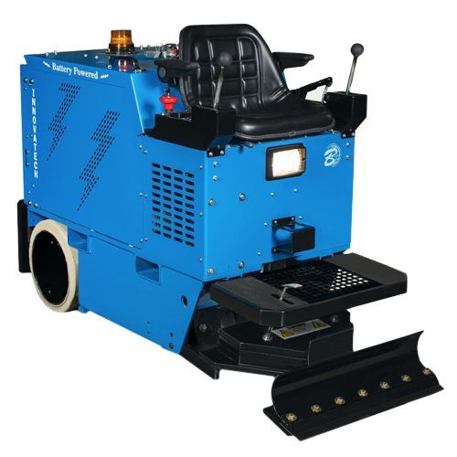 Blue tracked utility machine with black seat and controls on a white background