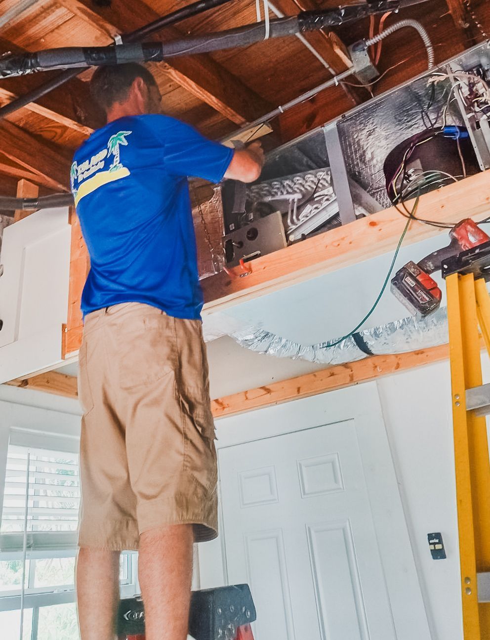 A/C Repair — Man Repairing A/C in Delray Beach, FL