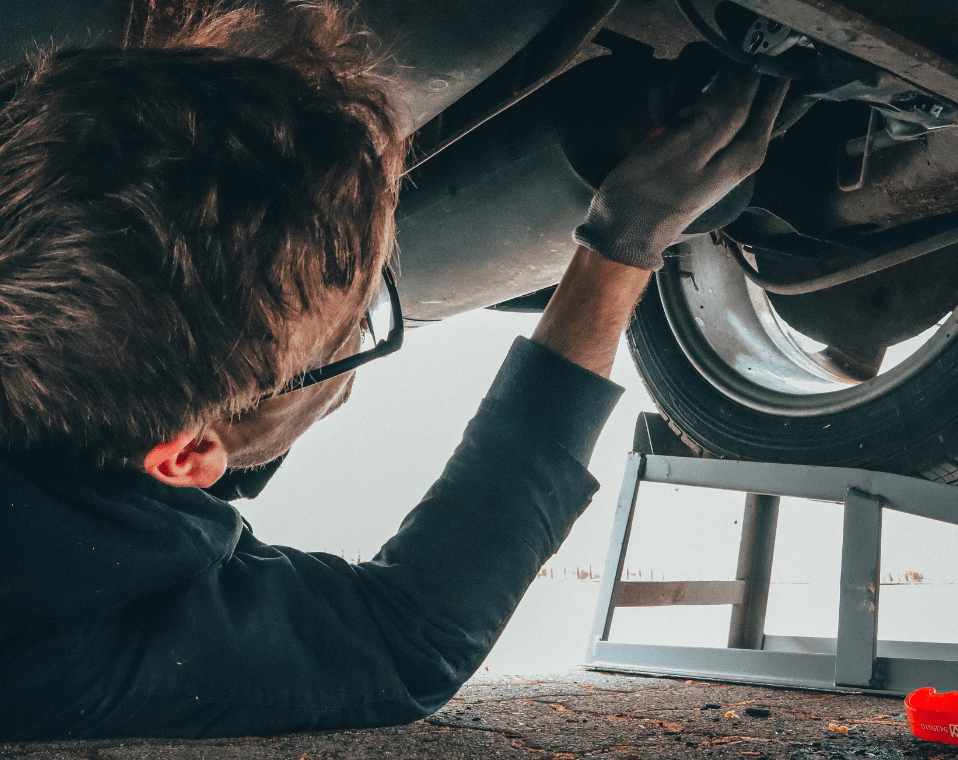 A mechanic doing an auto repair job