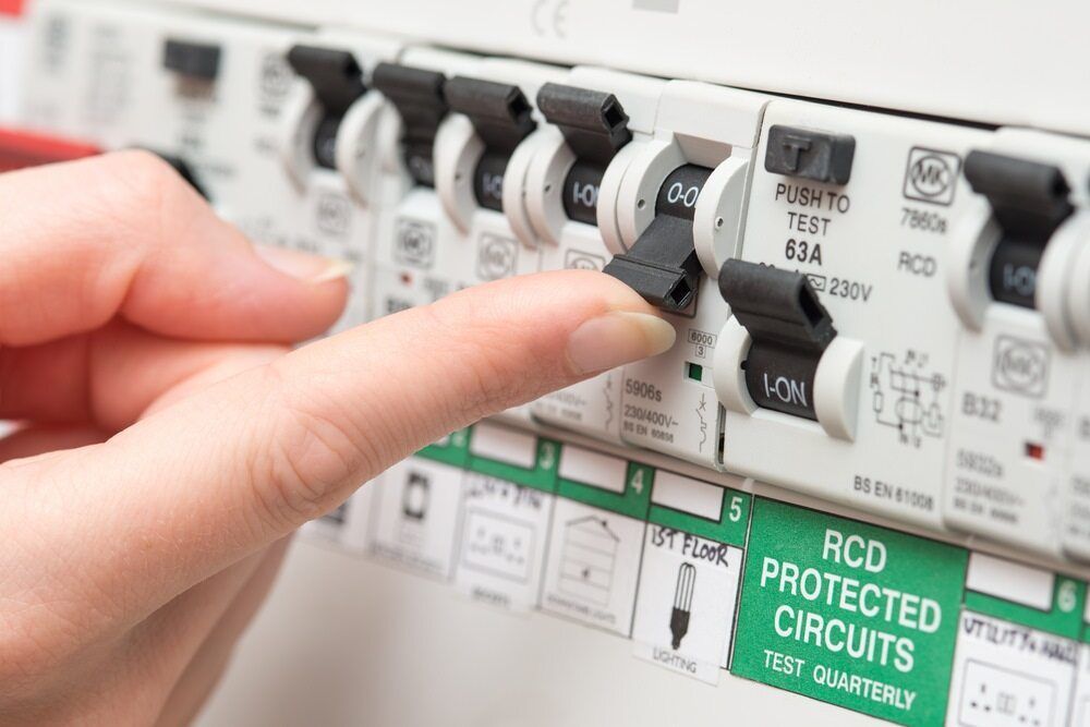 A Person is Pressing a Button on a Circuit Breaker — Maratustech In Woy Woy, NSW