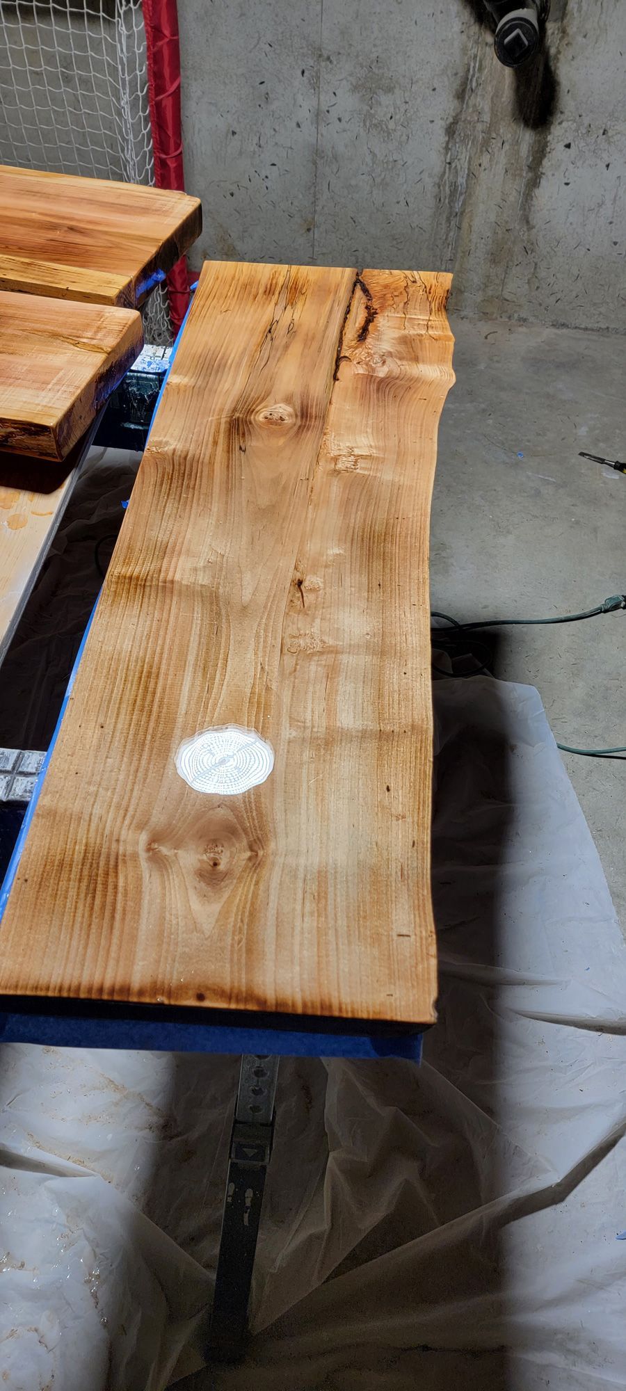 A piece of wood is sitting on top of a table.