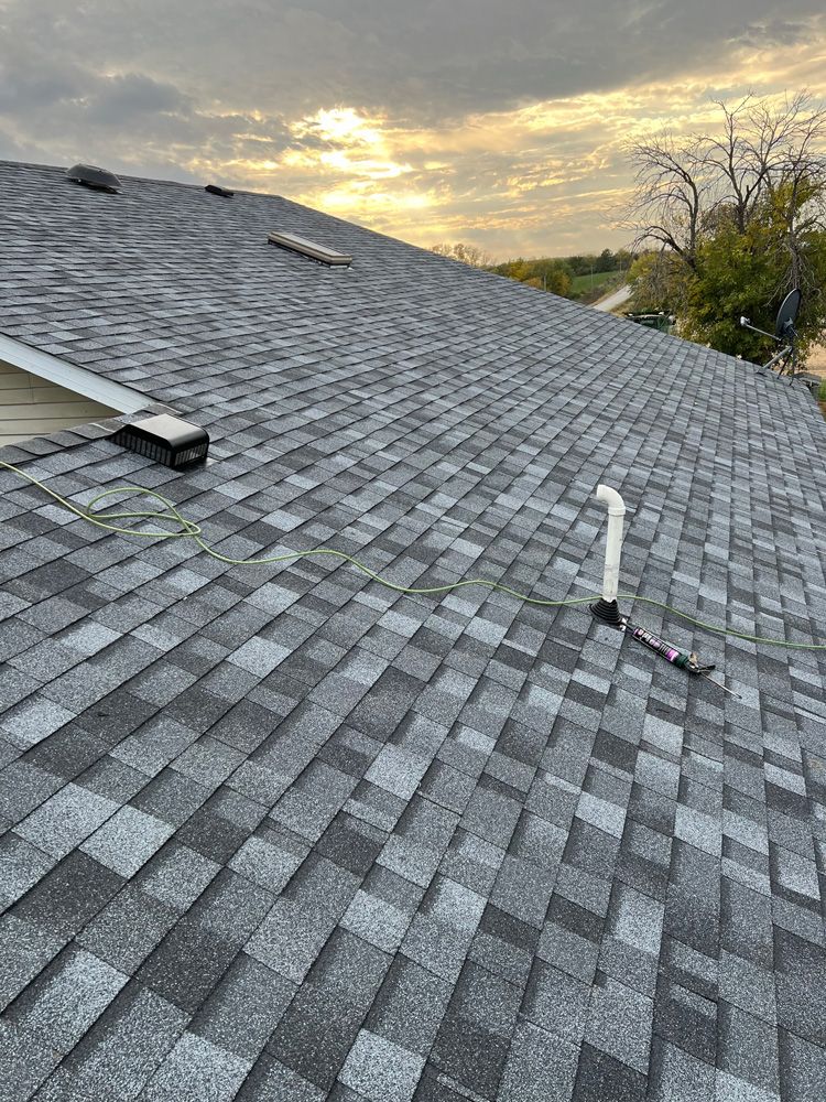 A close up of a roof with shingles on it.
