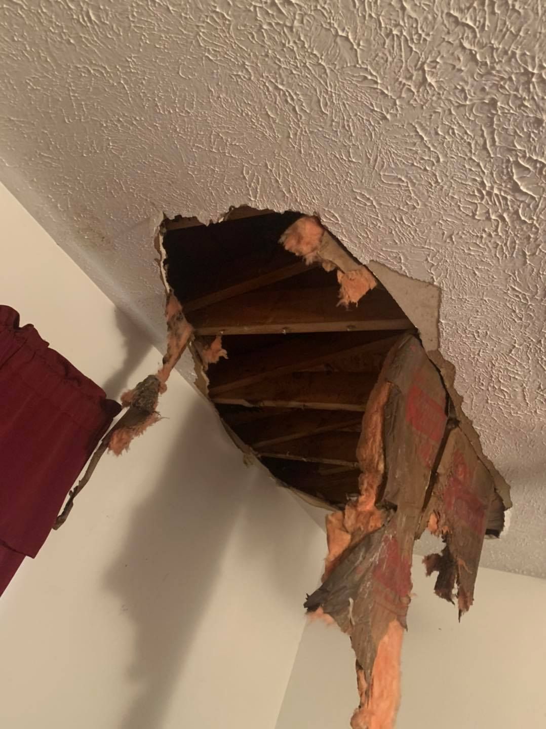 A hole in the ceiling of a room.