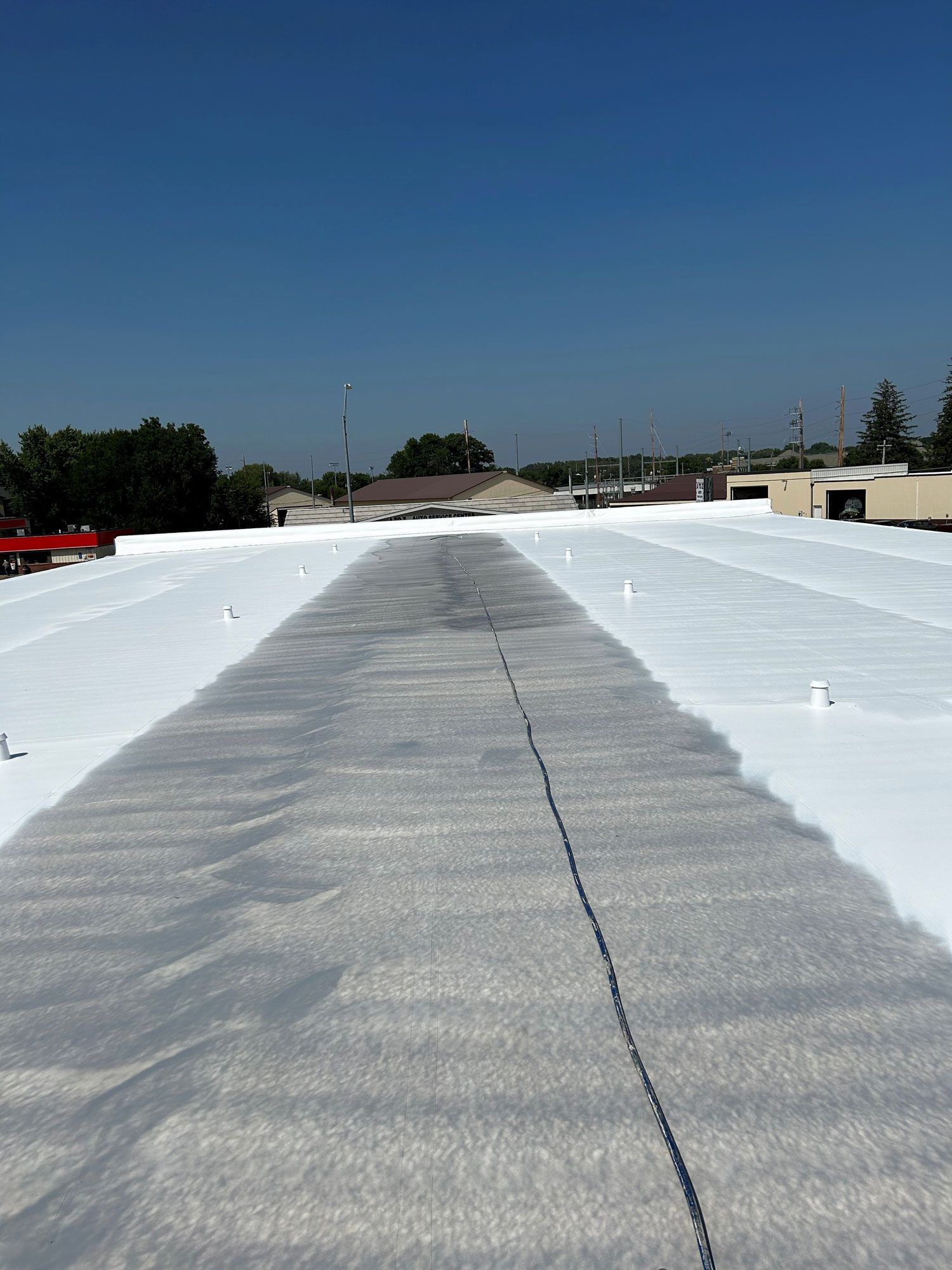 Roof Of A Building — Waverly, IA — Star Line Coatings