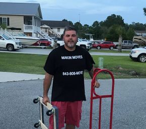 Makin Moves owner in a branded shirt with hand truck and dolly, Myrtle Beach moving company