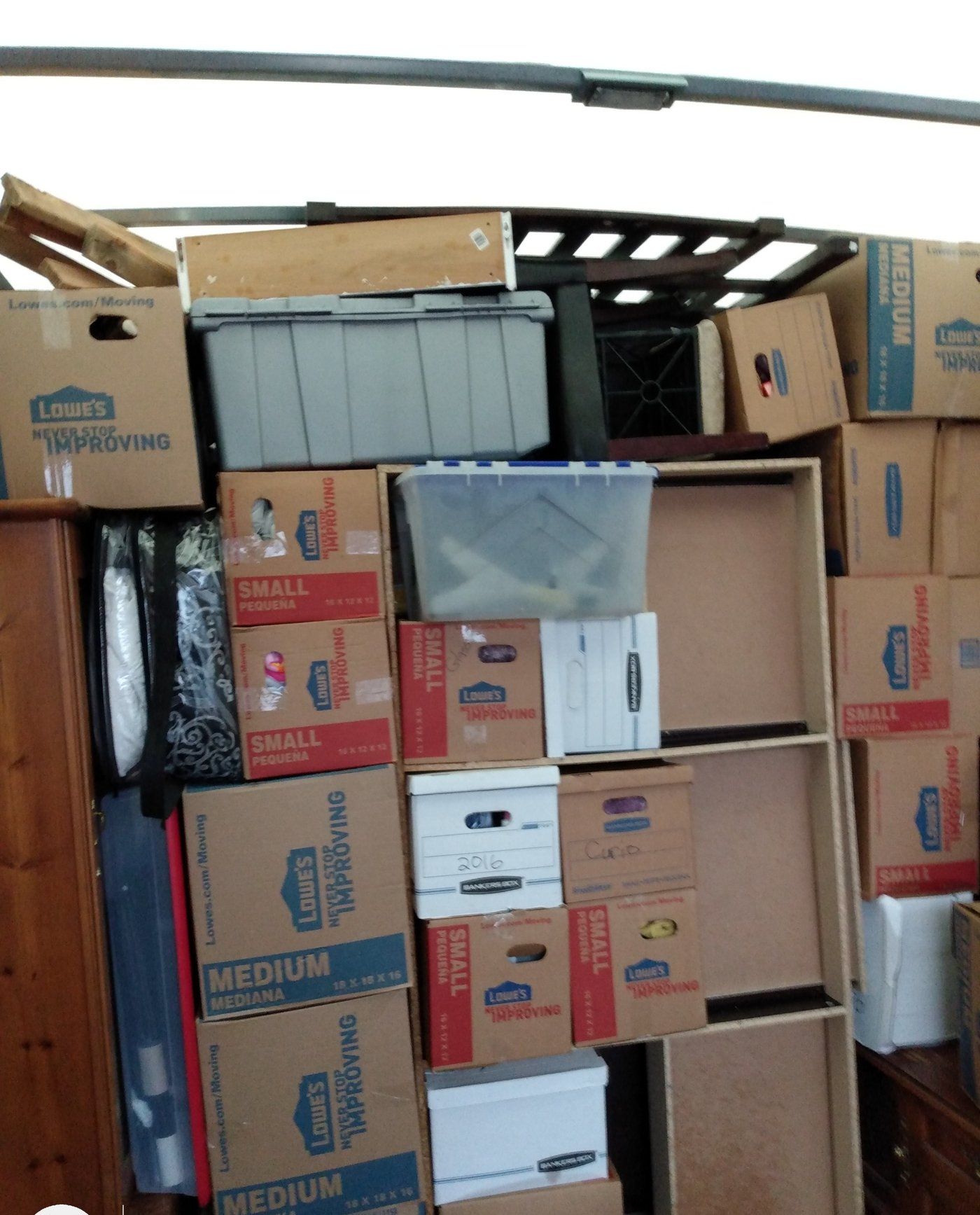 Moving truck packed floor to ceiling by the Makin Moves crew