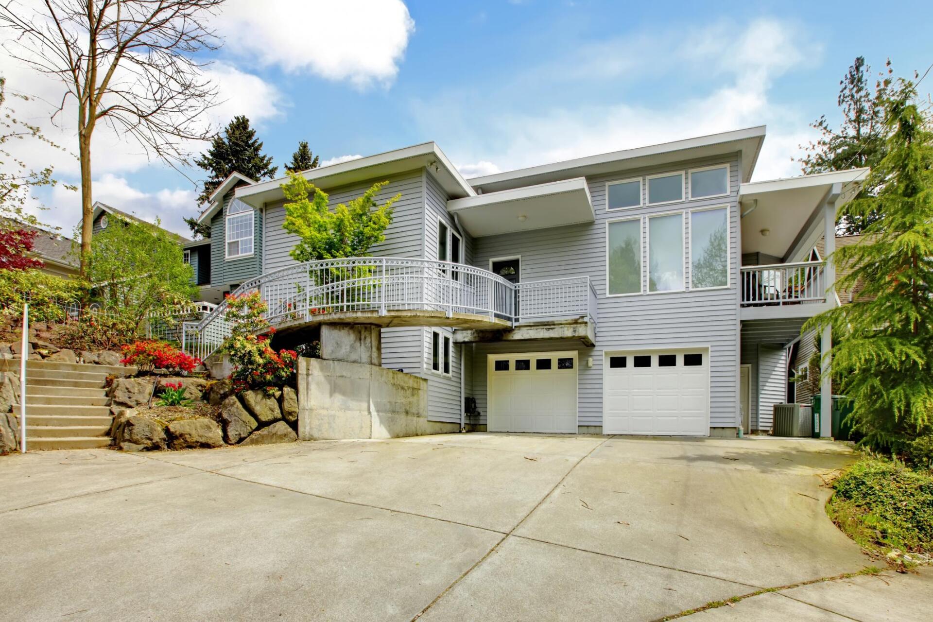 a house with concrete driveway