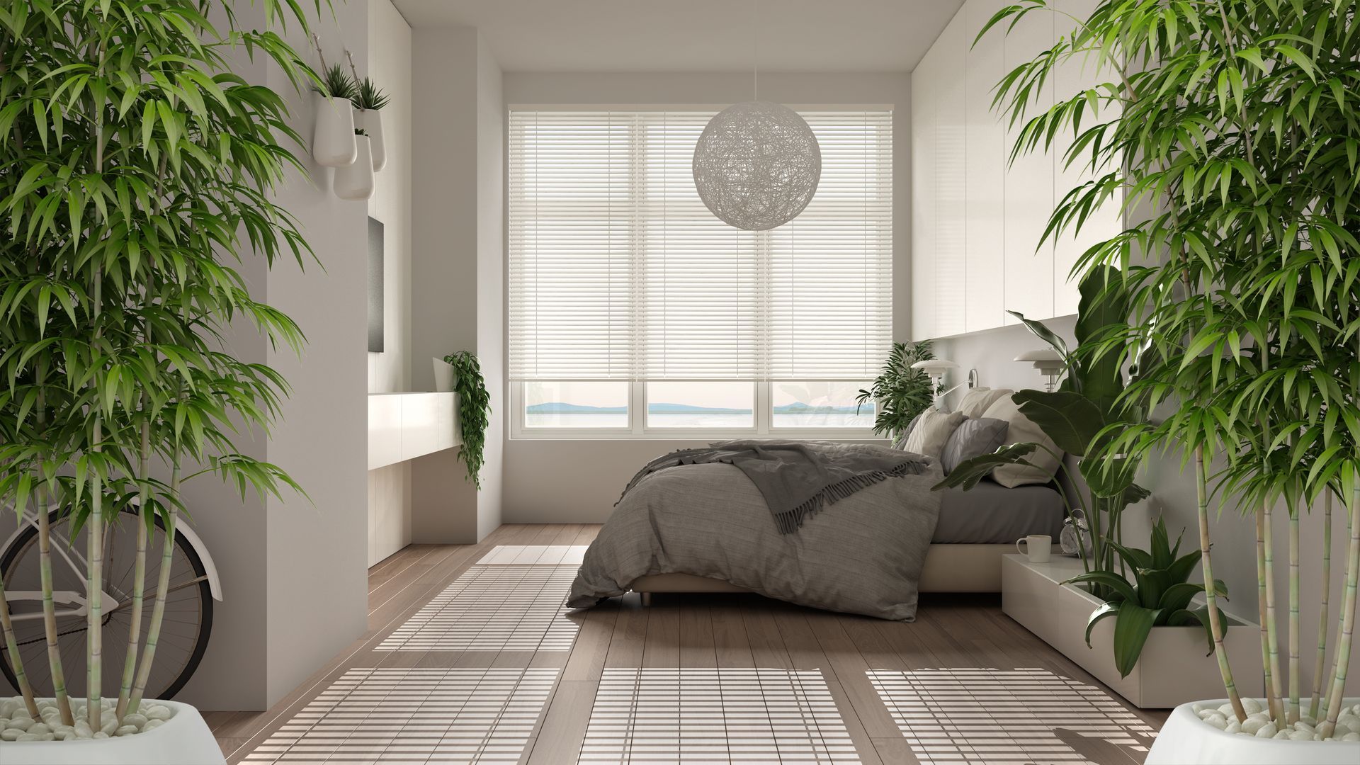 A clean, modern bedroom with a wide window, soft bedding, and lush house plants. A clean, modern bedroom with a wide window, soft bedding, and lush house plants.