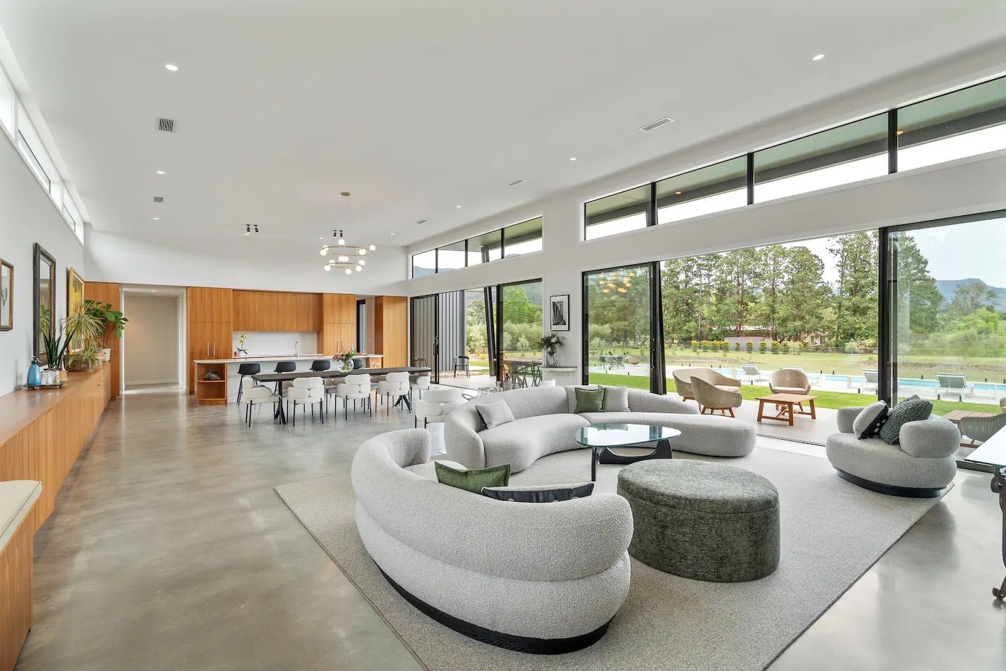 A living room filled with furniture and a large window. — That Painter Guy In South Nowra, NSW