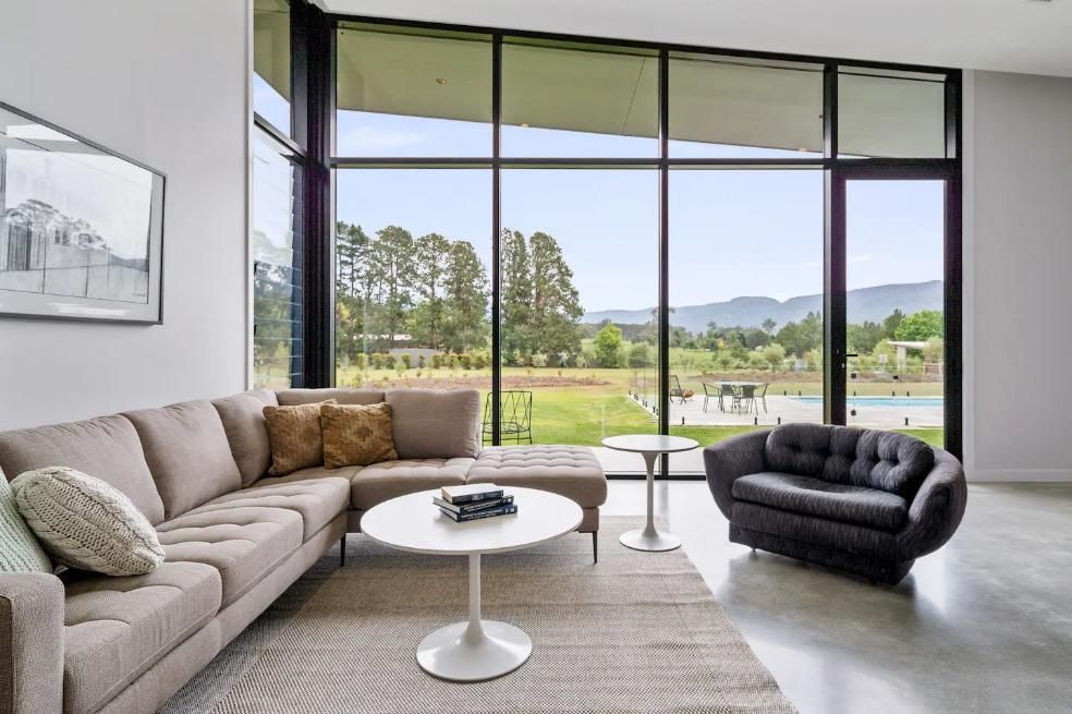 A Living Room With A Couch A Chair and A Table — That Painter Guy In South Nowra, NSW