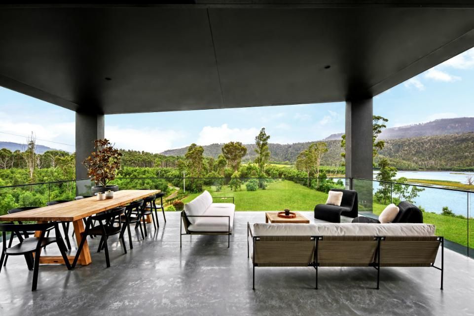 A Patio With A Table and Chairs and A View Of A Lake — That Painter Guy In South Nowra, NSW