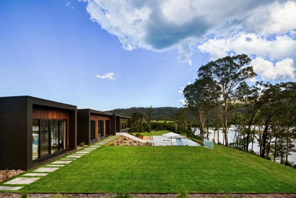 A Modern House With A Large Lawn In Front Of It and A Swimming Pool — That Painter Guy In South Nowra, NSW