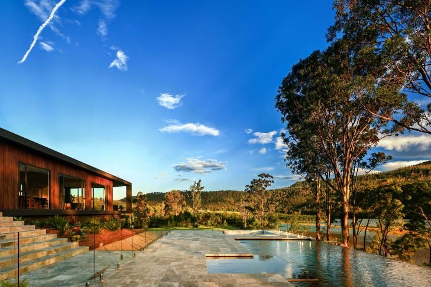 A House With A Swimming Pool In Front Of It and Trees In The Background — That Painter Guy In South Nowra, NSW