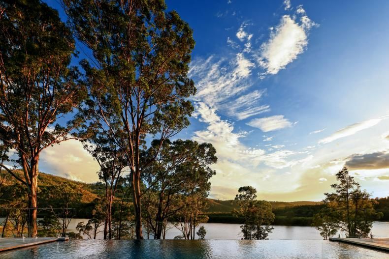 Swimming Pool Surrounded By Trees Overlooking A Lake — That Painter Guy In South Nowra, NSW