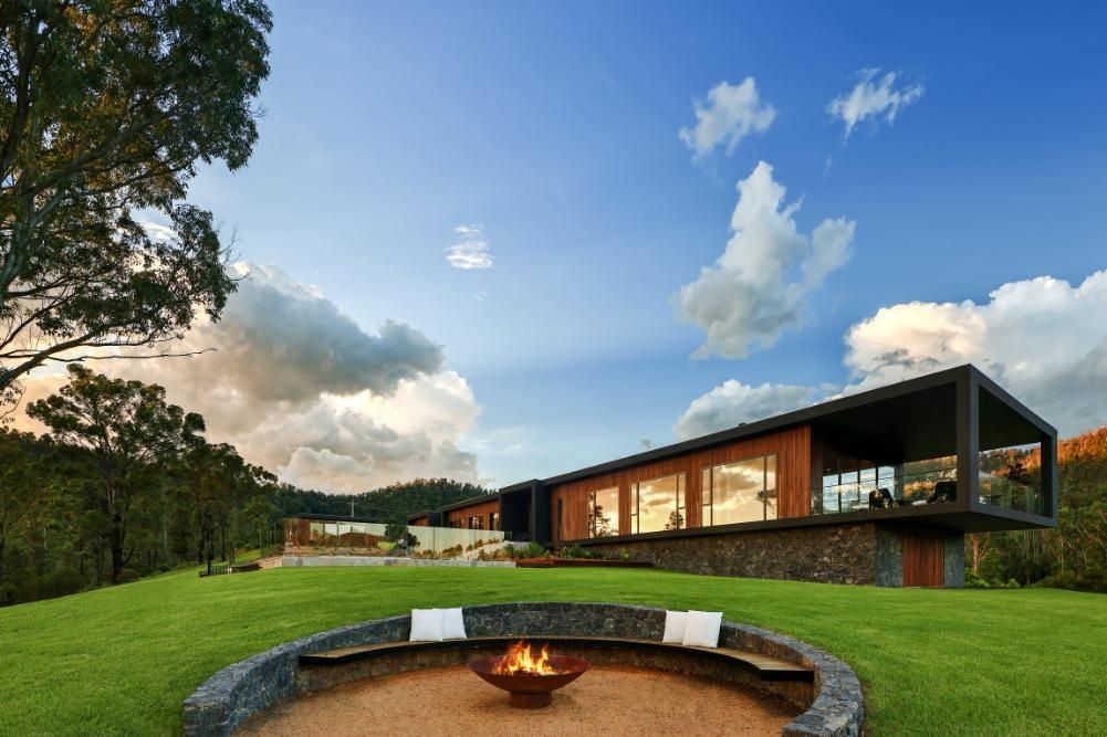 There Is A Fire Pit In The Middle Of The Grass In Front Of A House — That Painter Guy In South Nowra, NSW