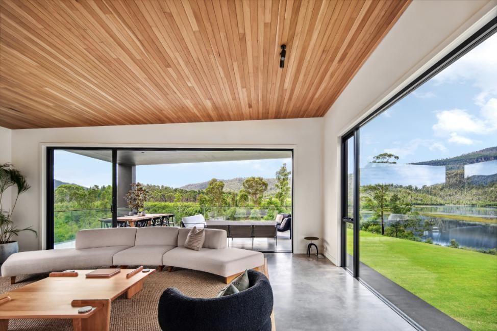 Living Room With A Couch , Chair , Table and Sliding Glass Doors — That Painter Guy In South Nowra, NSW
