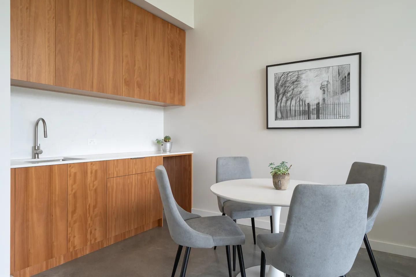A Kitchen With A Table and Chairs and A Sink — That Painter Guy In South Nowra, NSW
