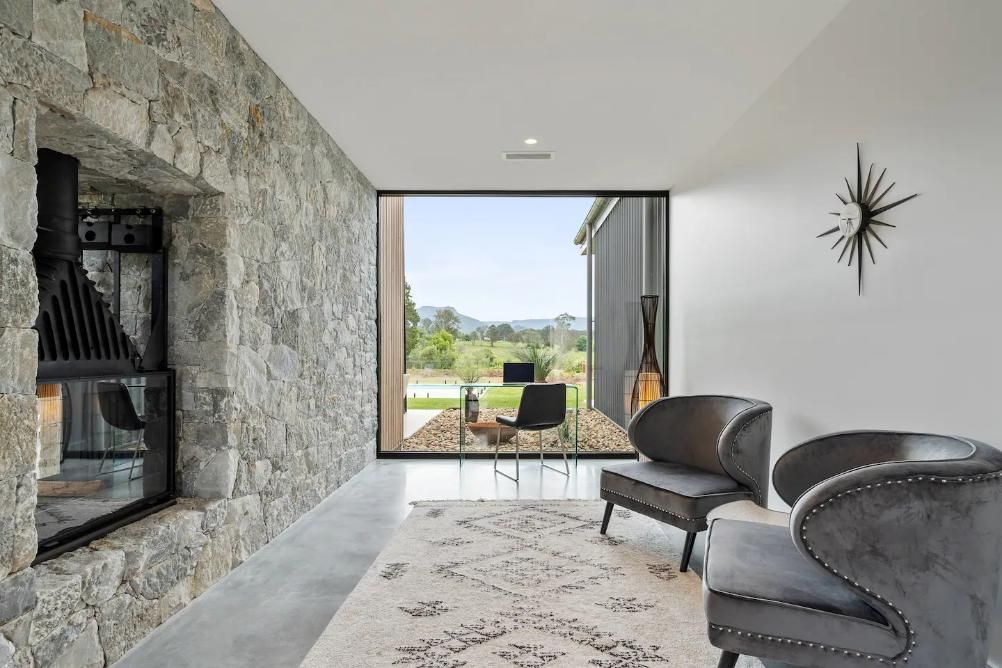 A Living Room With Two Chairs and A Fireplace — That Painter Guy In South Nowra, NSW