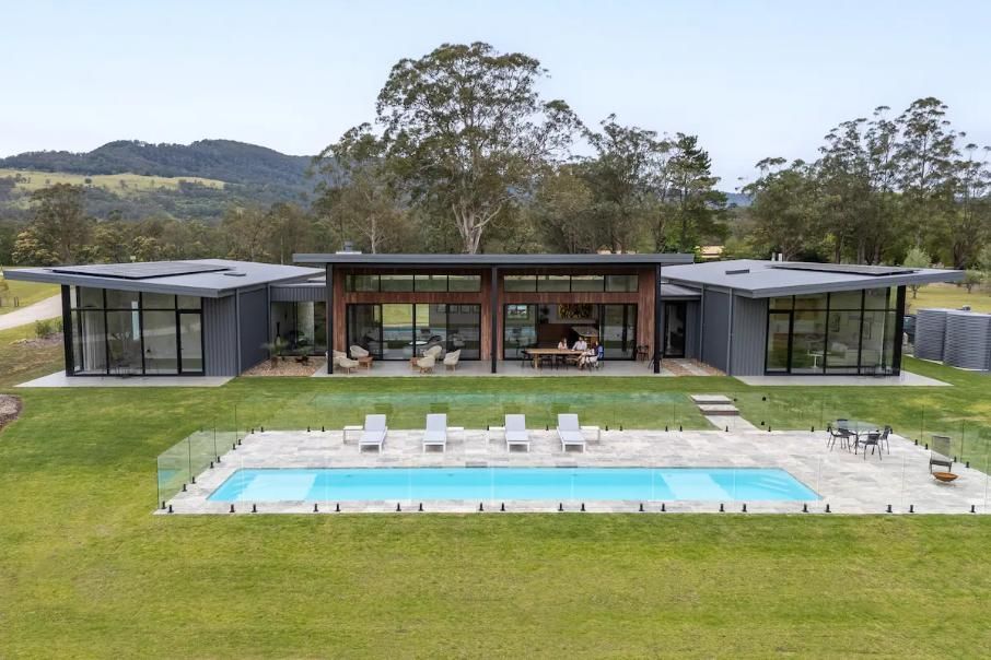 A Large House With A Large Swimming Pool In Front Of It — That Painter Guy In South Nowra, NSW