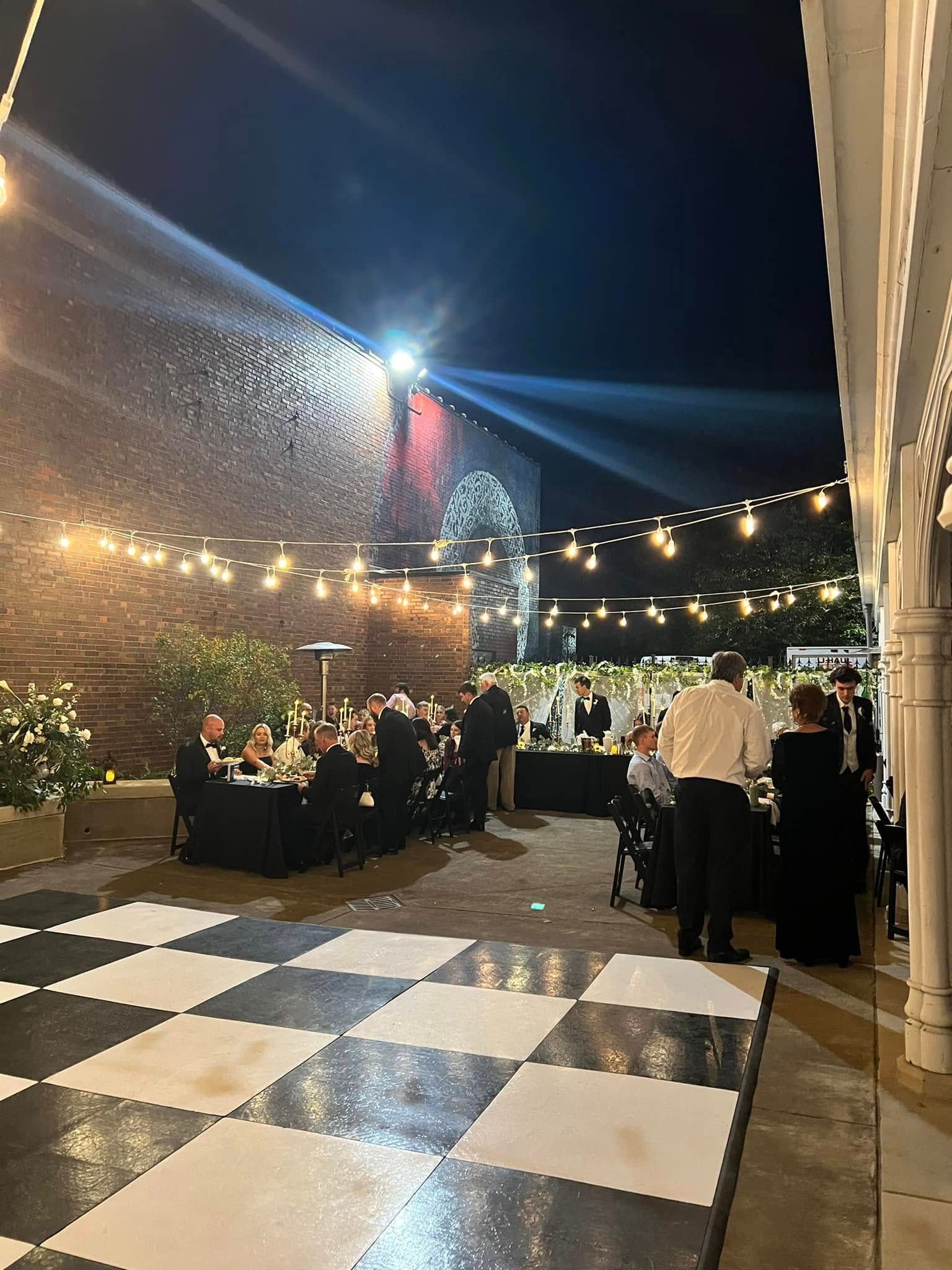 guests dining during outdoor wedding reception