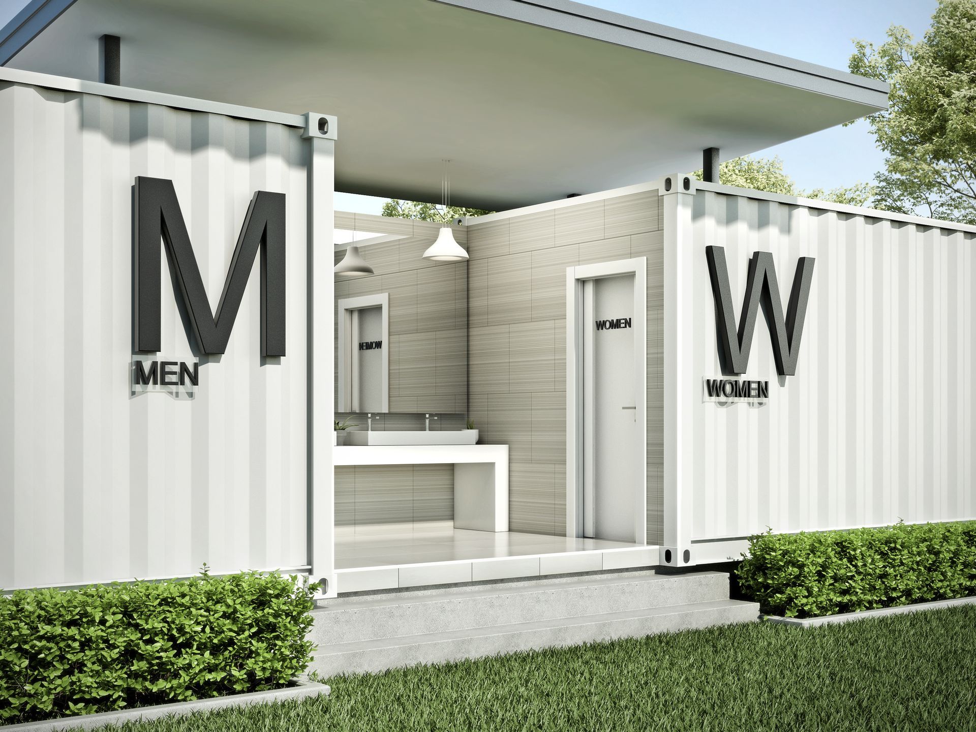 Außenansicht von weißen Toilettencontainern mit der Aufschrift „M Herren“ und „W Damen“.
