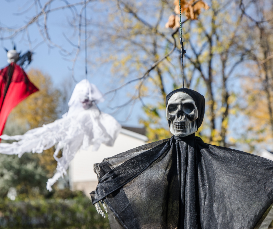Hanging Halloween Decorations on Trees