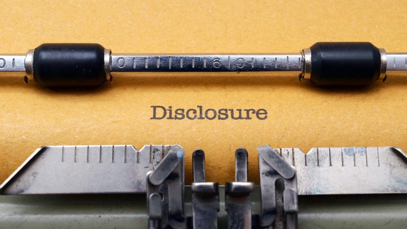 Disclosure written out on a typewriter