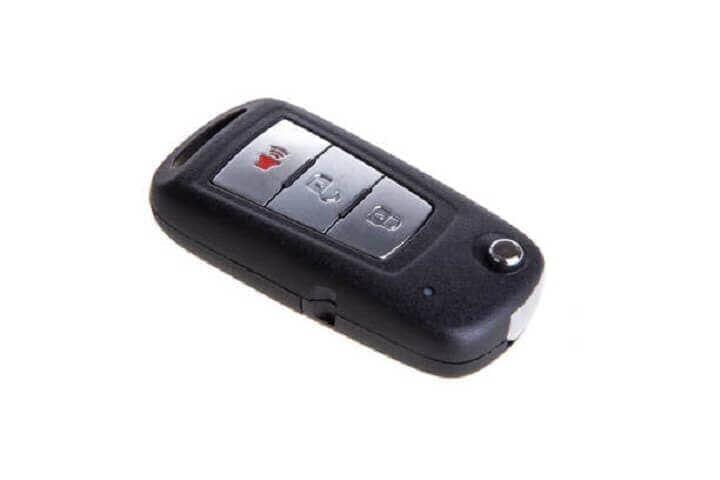 Una llave de auto con las letras a y b.