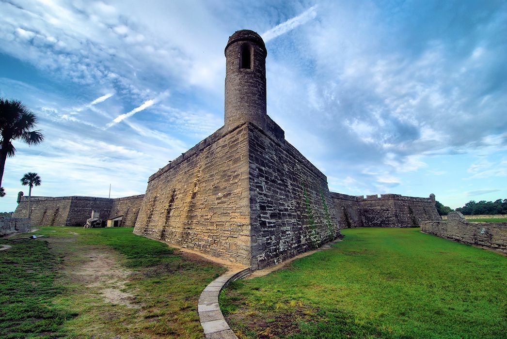 a large stone building with a tower on top of it .