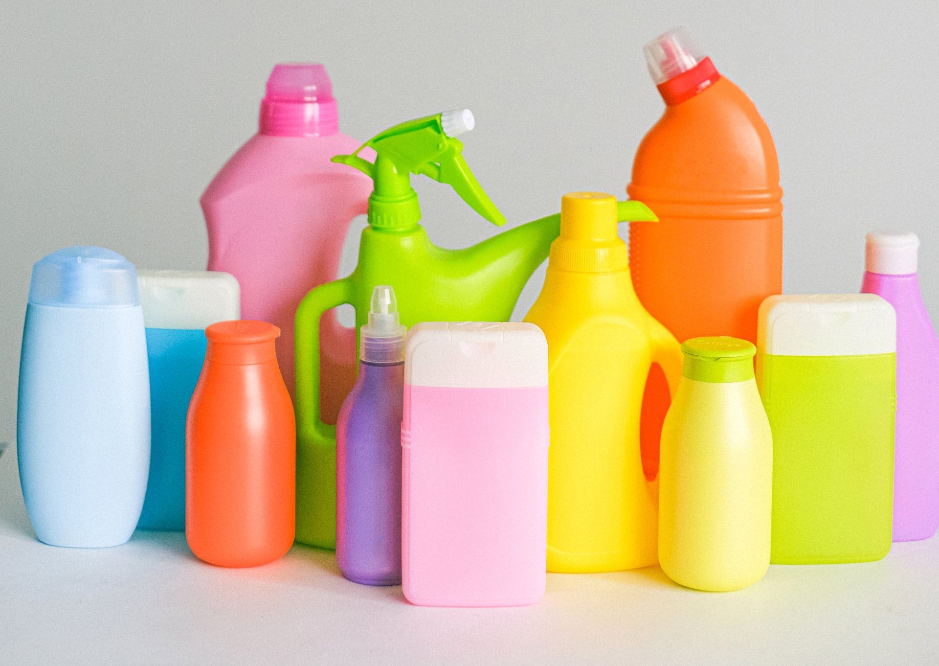 Colorful plastic bottles of cleaning and personal care products.