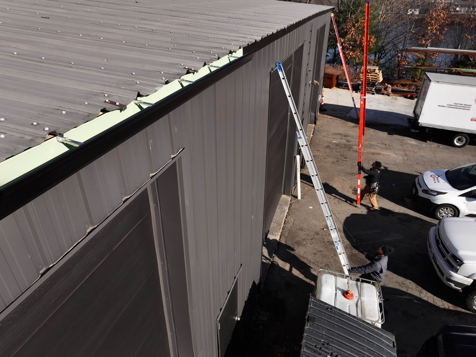 A ladder is attached to the side of a building