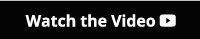 A black and white sign that says watch the video