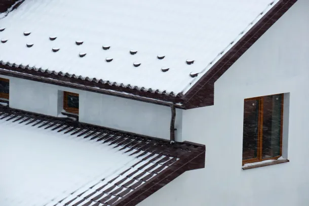 A ladder is attached to the side of a building.