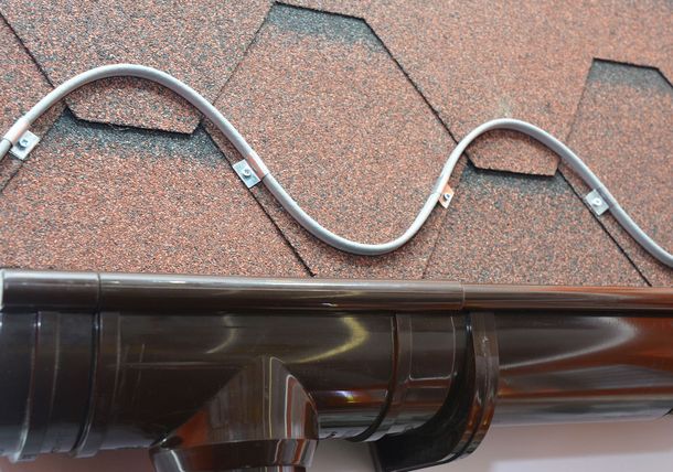 A ladder is attached to the side of a building.