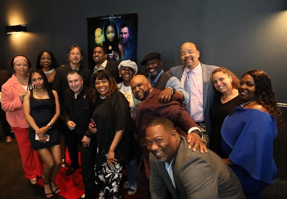 Director with cast members