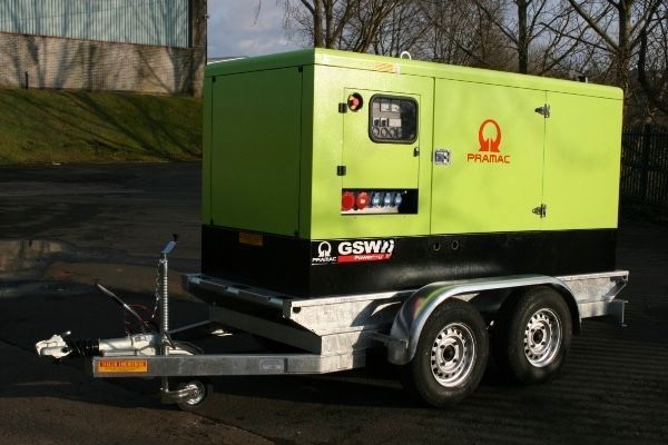A gswr generator is on a trailer in a parking lot