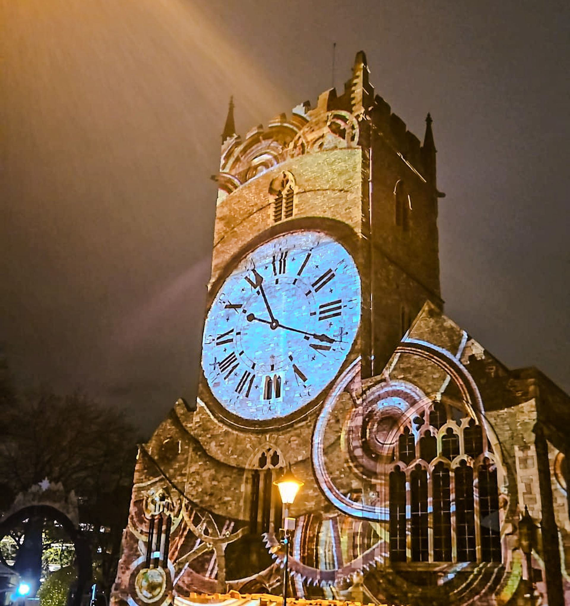 A large clock tower with roman numerals on it