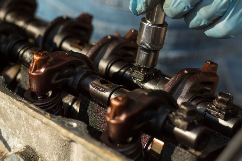 Mechanic Using a Wrench on a Car Engine — COOTA Automotive Services in Ballarat East, VIC