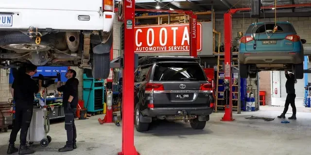 Mechanics Working in a Garage — COOTA Automotive Services in Ballarat East, VIC